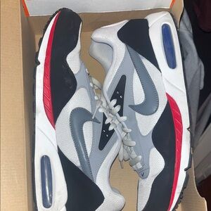 Nike Gray White Black Sneakers with Red Accents